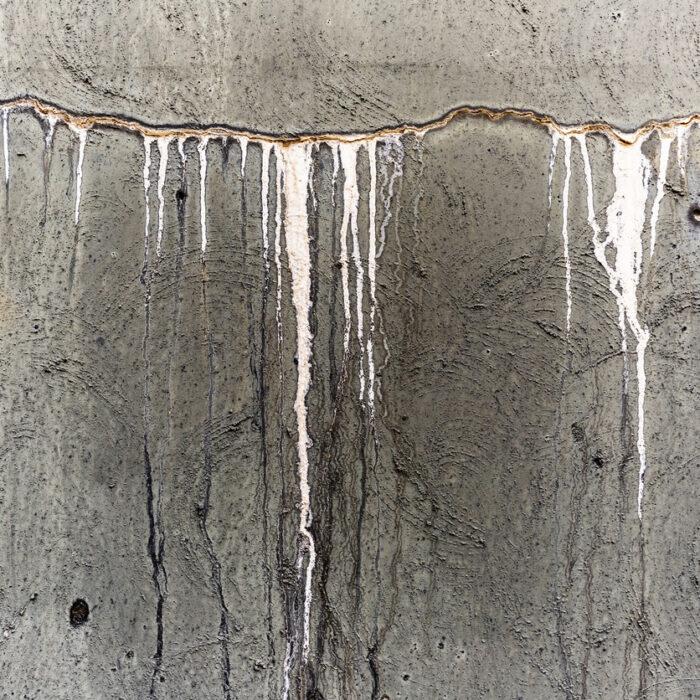Slow Dripping Cracked Concrete Wall On Old Water Tank