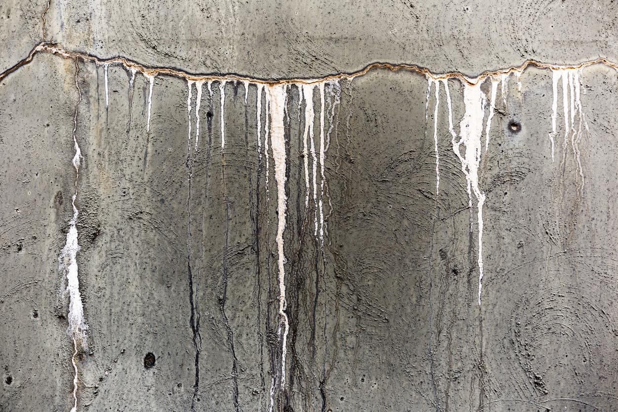 Slow Dripping Cracked Concrete Wall On Old Water Tank