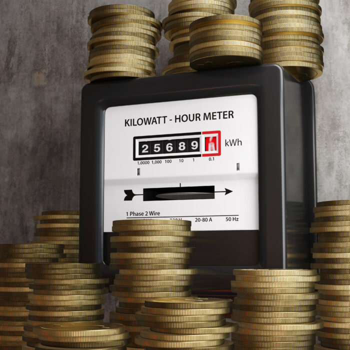 Stacks of gold coins around an electric meter. Illustration of the concept of increasing household energy bills.