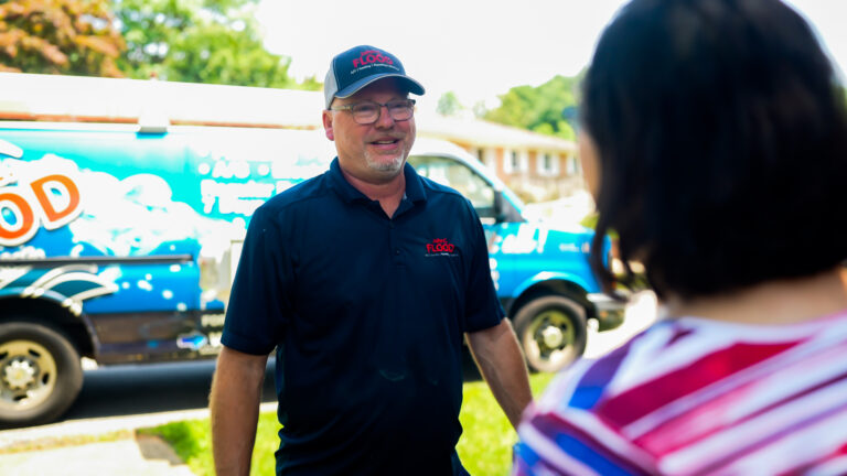 JCF Technician Greeting Woman