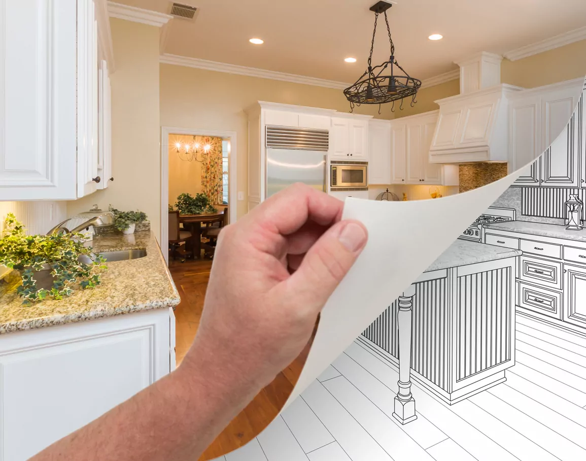 Hand Turning Page of Custom Kitchen Photograph to Drawing