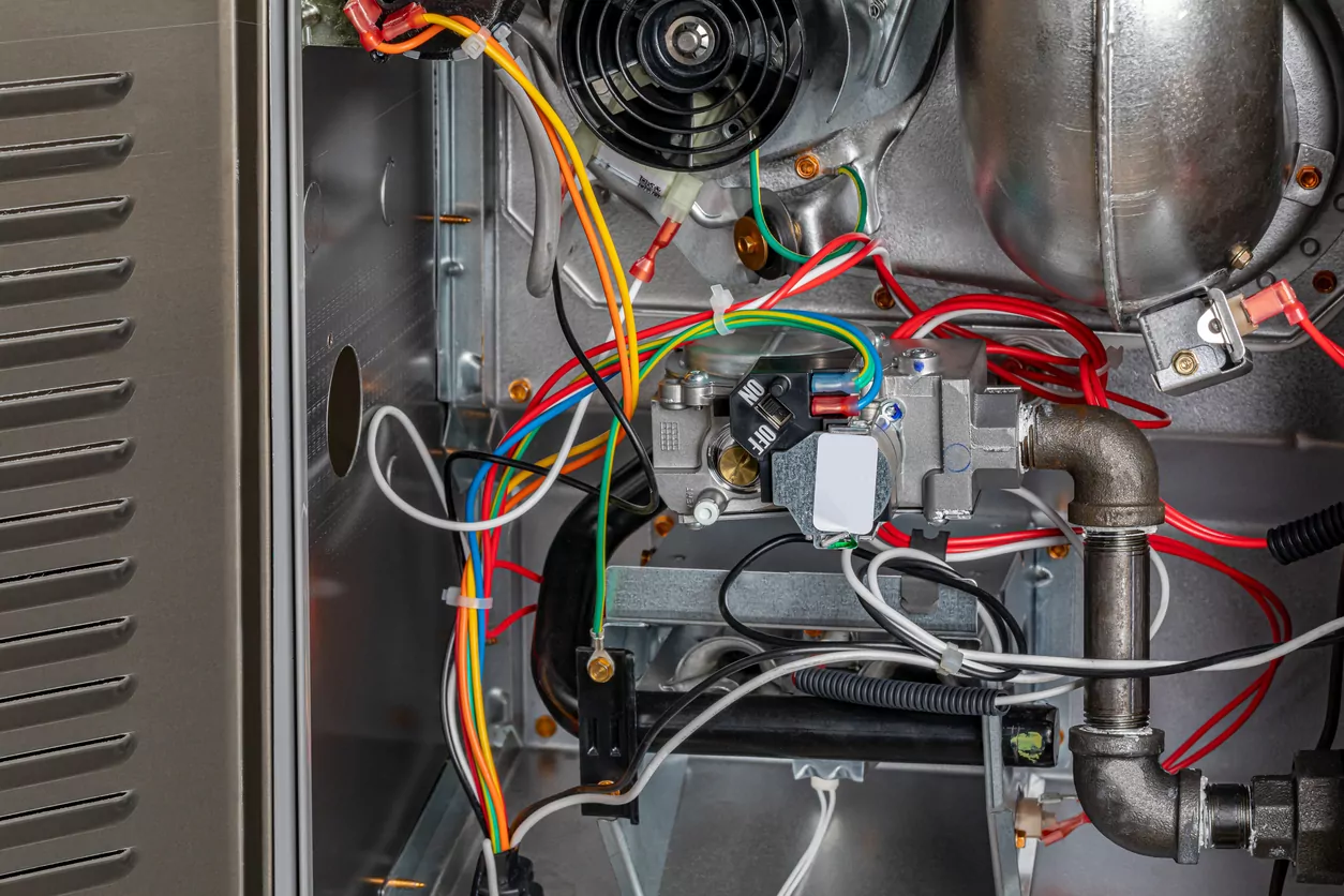 Furnace gas valve. HVAC maintenance, repair, service and installation concept.